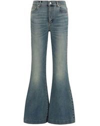 McQueen - Blue Cotton Flared Jeans - Lyst