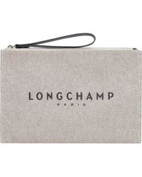 Longchamp - Logo Print Zipped Clutch Bag - Lyst