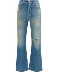 Amiri - Slash Flared Distressed Jeans Cotton - Lyst