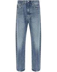 Versace - Studded Jeans - Lyst