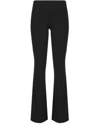 Courreges - Flared Trousers With Cut Out Details - Lyst