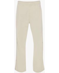 JW Anderson Boot Cut Track Trousers - White