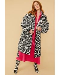 Jayley - Zebra Print Faux Fur Midi Coat With Belt - Lyst