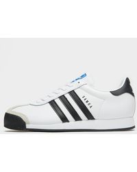 all black adidas samoa