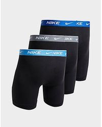 string sport femme nike