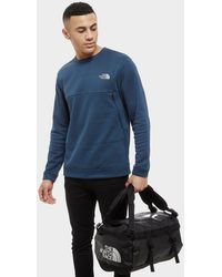 The North Face Holdalls and weekend bags for Men - Up to 48% off at Lyst.com