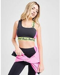 Red Run Activewear - Twin Flame Asymmetric Sports Bra - Lyst