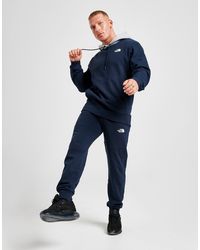 navy north face tracksuit bottoms