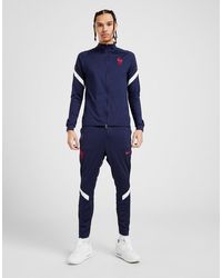 nike tracksuit blue and black