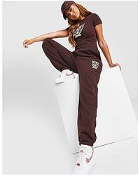 Nike Varsity Joggers in Red | Lyst UK