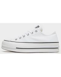 white leather converse lift