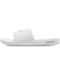 lacoste white slippers