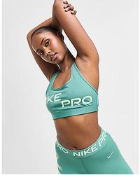 Nike - Pro Training Swoosh Graphic Sports Bra - Lyst