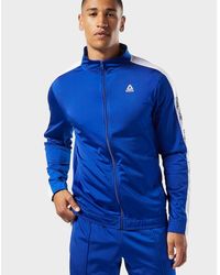 blue reebok tracksuit