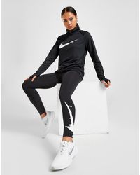 nike swoosh tights