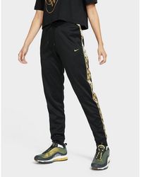 nike division poly track pants