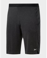 reebok men's crossfit stacked logo pants