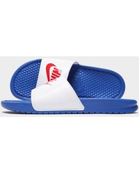 blue nike benassi slides