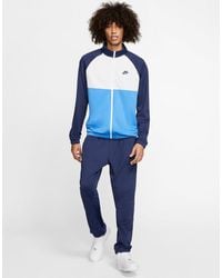 blue and white nike jumpsuit