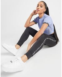 nike pantalon de survêtement tape poly femme nike pantalon de survêtement tape poly femme