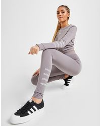 adidas originals linear sweater in lilac and black