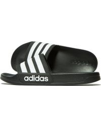 Adidas adilette cloudfoam Plus mono Slide sandalias en negro para hombres Adidas adilette cloudfoam Plus mono Slide sandalias en negro para hombres