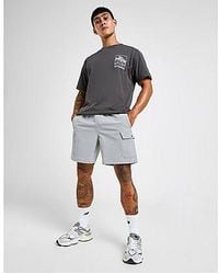 New Balance - Ripstop Cargo Shorts - Lyst