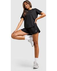 Asics - Short Core Split - Lyst