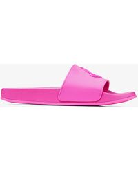 Damen Schuhe Flache Schuhe Zehentrenner und Badelatschen Jimmy Choo Gummi Port/f in Pink 
