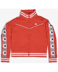 champion tape woven track top