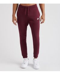 red nike joggers mens