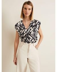 Phase Eight - Celyn Notch Printed Blouse - Lyst
