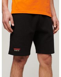 Superdry - Sport Tech Logo Tapered Shorts - Lyst