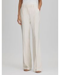 Reiss - Petite Millie Flared Tailored Trousers - Lyst