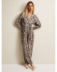 Phase Eight - Constance Snake Print Jumpsuit - Lyst