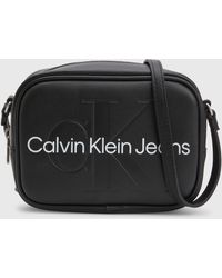 Calvin Klein - Faux Leather Embossed Camera Bag - Lyst