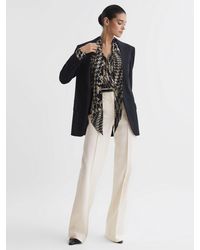Reiss - Petite Claude Flared Trousers - Lyst