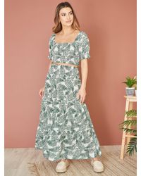 Yumi' - Cotton Palm Leaf Print Ruched Waist Maxi Skirt - Lyst