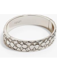 COACH - Hinged Engraved Signature C Crystal Bangle - Lyst