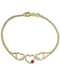 Created Forever - 1/6Ct Tgw Created Ruby And 1/7Ct Tw Lab-Grown Diamond Triple Heart Bracelet - Lyst