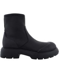 Ferragamo - Dorie Leather Lug-Sole Ankle Boots - Lyst