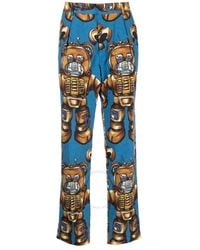 Moschino - Allover Robot Print Cotton Trousers - Lyst
