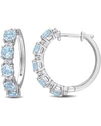 Amour - 3 1/4 Ct Tgw Sky Topaz And Topaz Hoop Earrings - Lyst