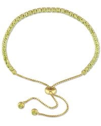Amour - 3 1/4 Ct Tgw Peridot Tassel Bolo Bracelet - Lyst