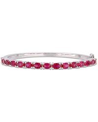 Amour - 11-1/4 Ct Tgw Oval-Cut Created Ruby Bangle - Lyst