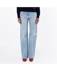 Versace - All Over Monogram Denim Jeans - Lyst