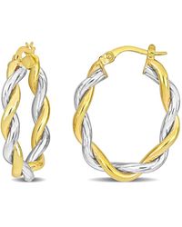 Amour - 27Mm Twisted Oval Hoop Earrings - Lyst
