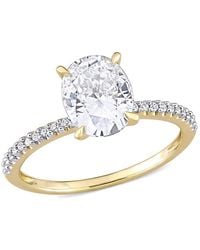 Amour - 2 Ct Dew Created Moissanite And 1/10 Ct Tw Diamond Oval Solitaire Engagement Ring - Lyst