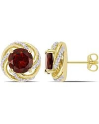 Amour - 4 1/3 Ct Tgw Garnet And Topaz Swirl Stud Earrings - Lyst