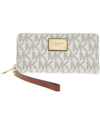 Michael Kors - Michael Jet Set Travel Logo Continental Wallet - Lyst